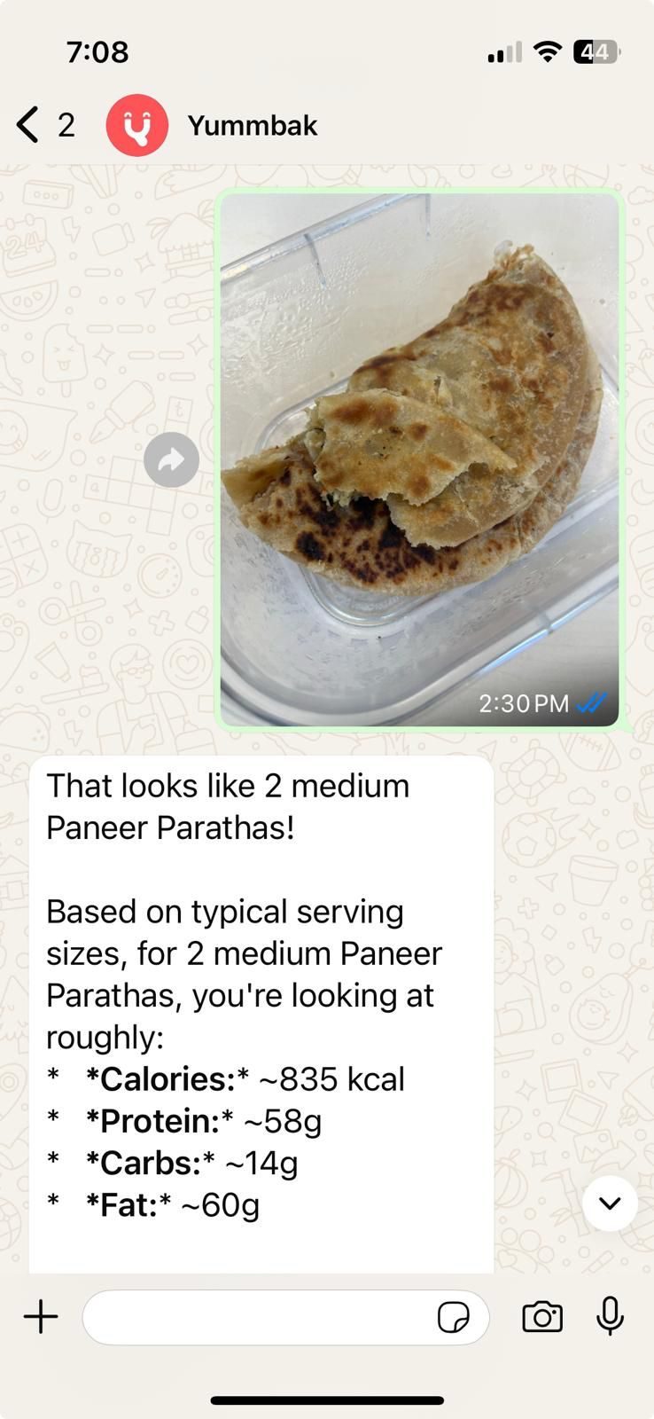 Yummbak WhatsApp conversation showing instant nutrition breakdown for paneer parathas